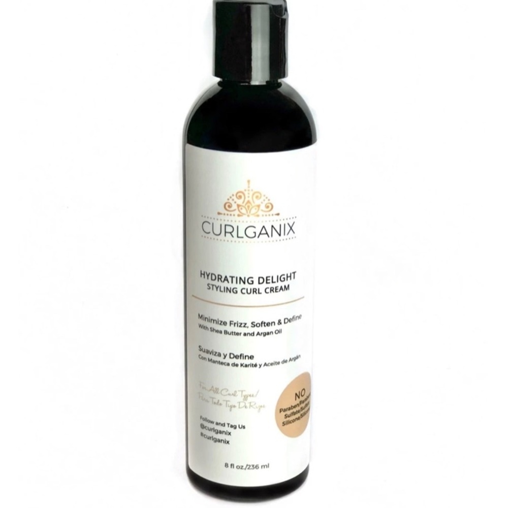 Curlganix cream and Denman inspired brush/black
